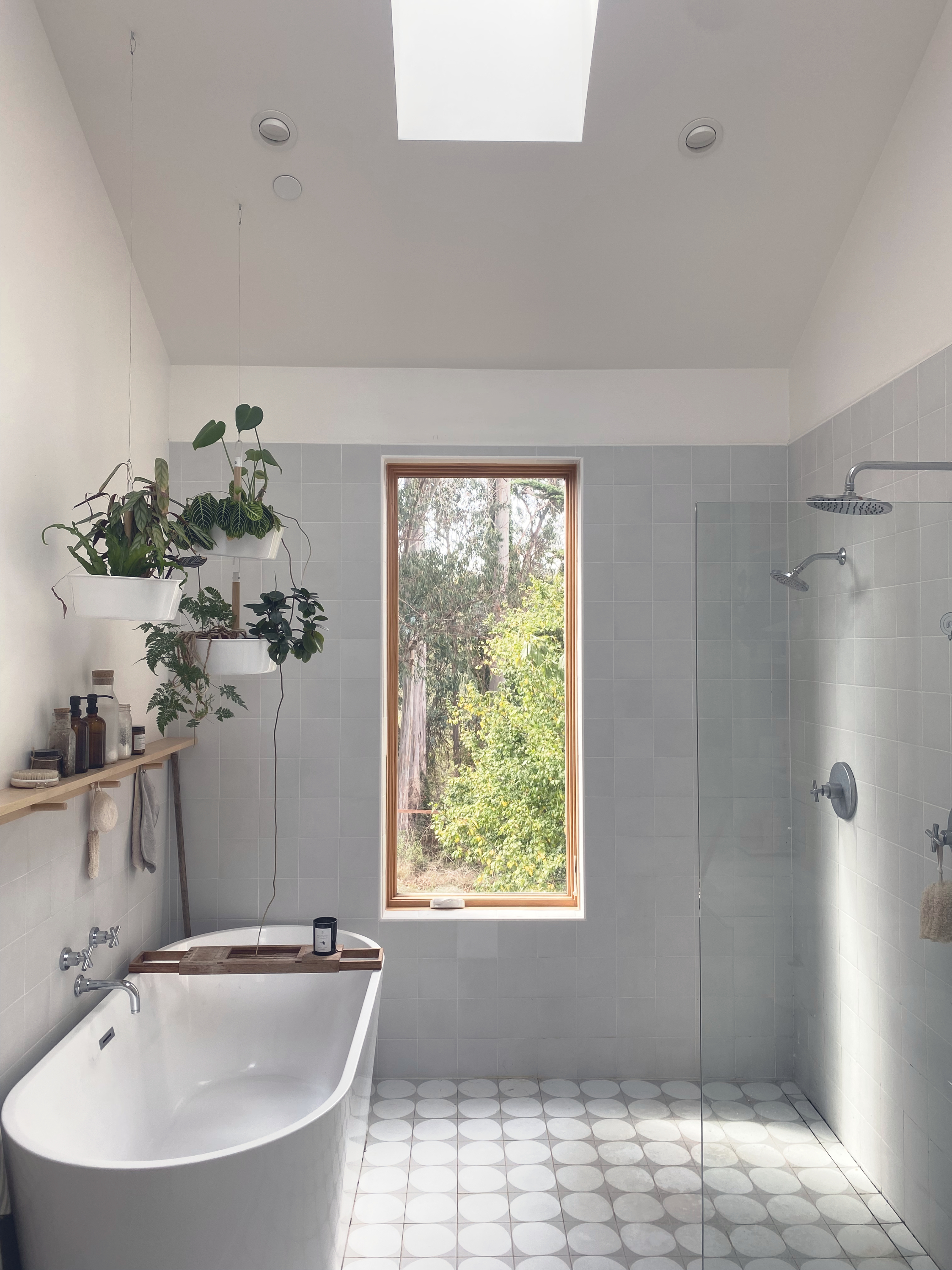 Finished bathroom with natural light and tile detail